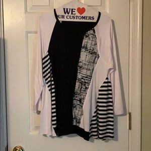 Black and white top almost tunic length.